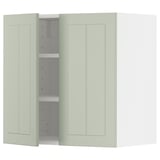 A light green METOD kitchen cabinet with two doors and adjustable shelves, set against a white background.