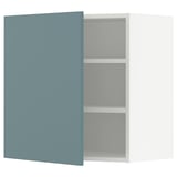 A turquoise METOD wall cabinet with an open door revealing an empty shelf inside.