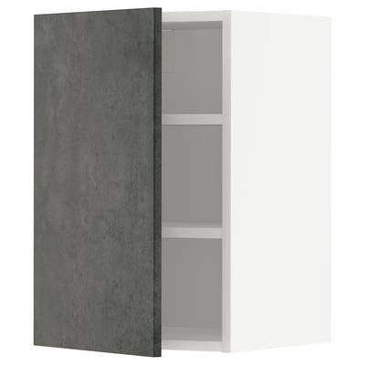 Image depicts an open METOD kitchen cabinet with dark gray kalhyttan fronts, featuring two adjustable shelves.