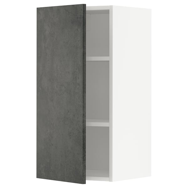 A modern kitchen cabinet with a dark grey concrete-effect door from the METOD system by ikea. It has a rectangular shape and an urban design.