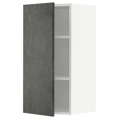 A modern kitchen cabinet with a dark grey concrete-effect door from the METOD system by ikea. It has a rectangular shape and an urban design.