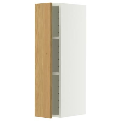 A white METOD wall cabinet with a light oak door and a single shelf inside. The cabinet is rectangular and modern in design.