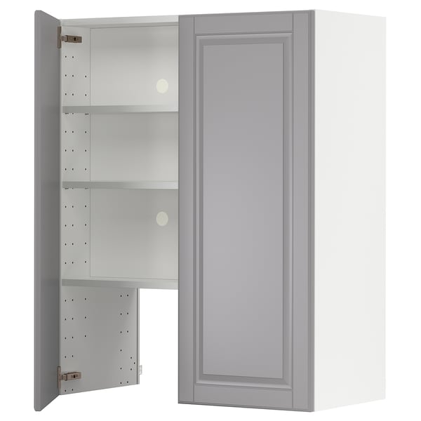 Gray kitchen cabinet with door open, revealing adjustable shelves. Made of fiberboard with a painted finish. Traditional style with beveled edges.