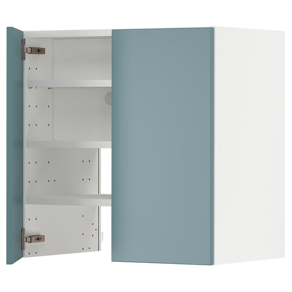 Turquoise METOD kitchen cabinet with white shelves and silver hinges.