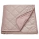 Light pink recycled velvet bedspread, folded square, soft, luxurious.