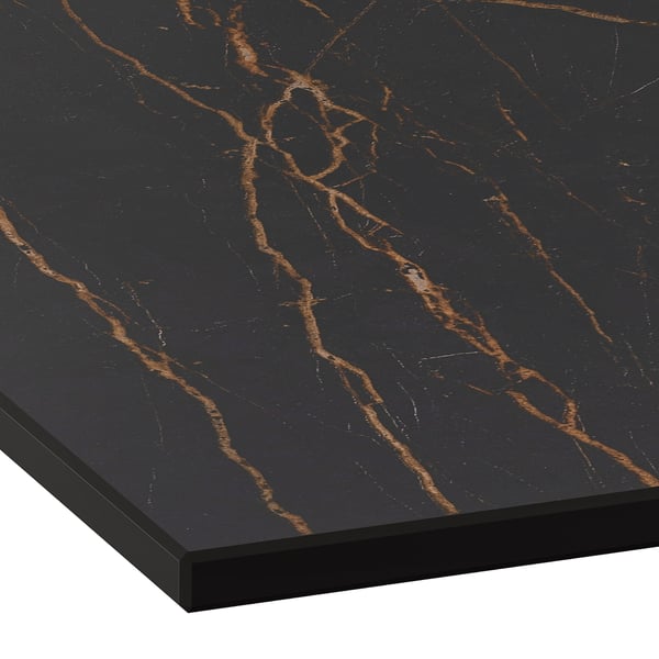 Sleek, black high-pressure porcelain countertop with striking gold veining. Elegant, durable, and easy-to-clean.