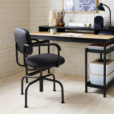 Modern black MULLSJÖ office chair with ergonomic design under a simple desk.