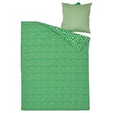 Green kids bedding set, featuring a playful crocodile print duvet and solid green pillow on white background.