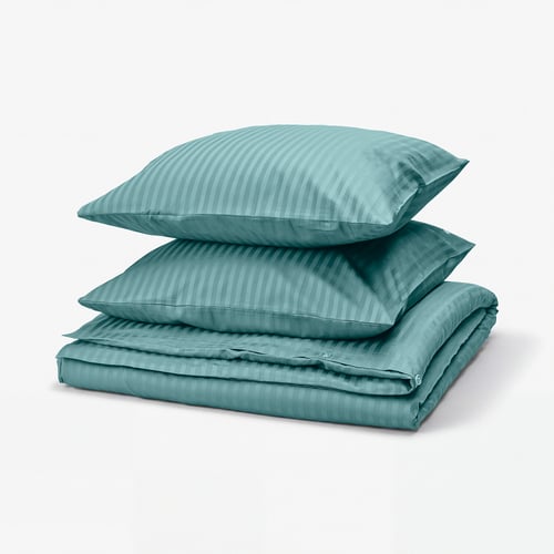 NATTJASMIN bedding set in teal with subtle stripes, made of soft cotton-lyocell blend, neatly folded.