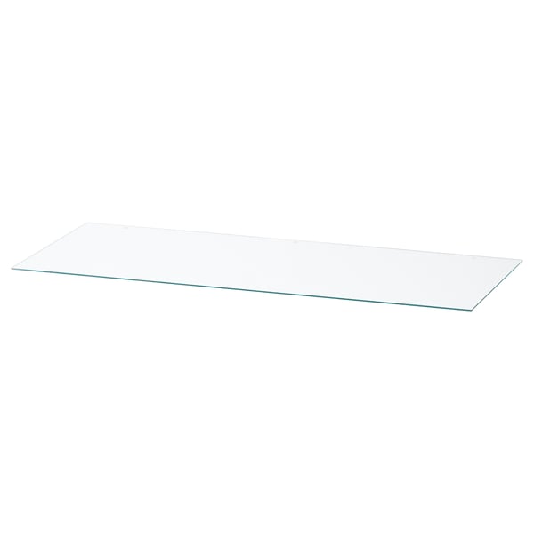 A rectangular glass top named NORDLI. Its clear and made of tempered glass, designed to protect and enhance a chest of drawers.
