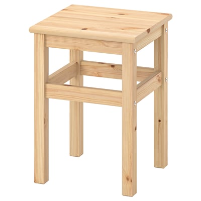 The ODDVAR stool is a light wooden piece with a rectangular seat and four legs, perfect for any room.