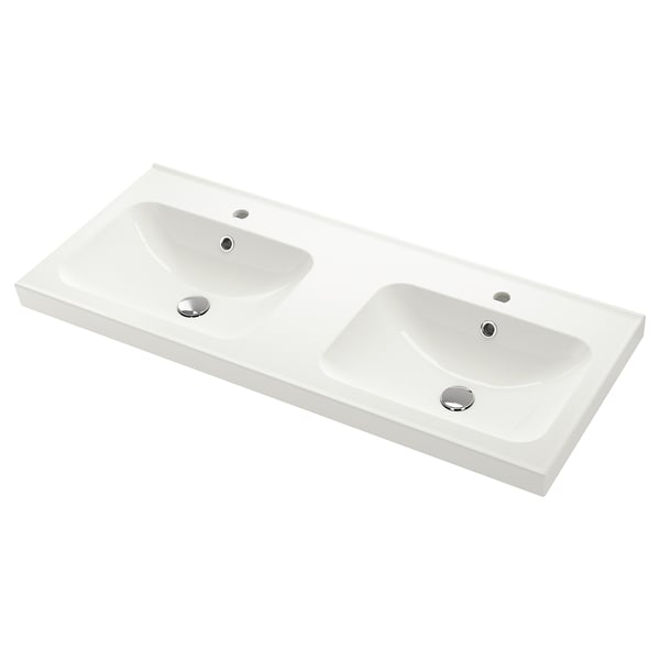 Double sink vanity in white, smooth curved design. Perfect for modern bathrooms.