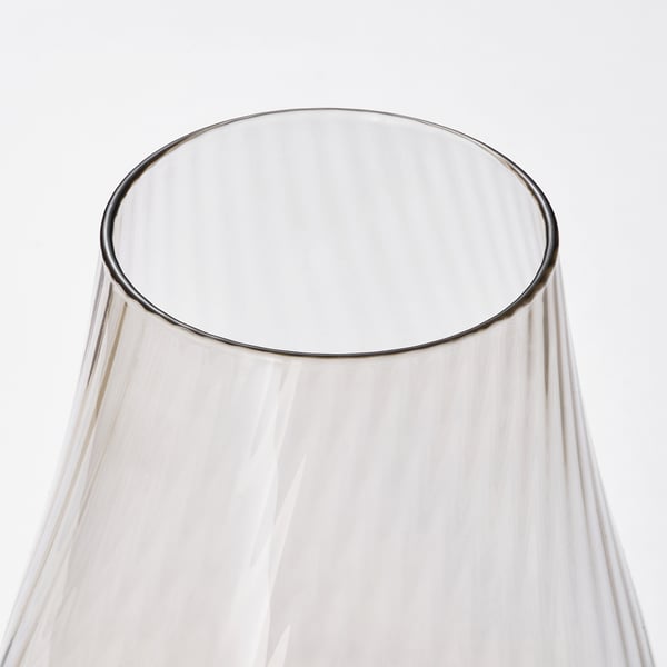 Clear glass vase with smooth, curved design, showcasing quality and simplicity.
