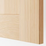 Close-up of light wooden panel with smooth, even grain texture; shows quality craftsmanship.