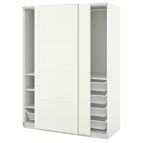 An ikea PAX wardrobe in white with open sliding doors, revealing shelves and mesh drawers inside.
