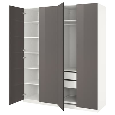 A grey and white ikea PAX wardrobe with open doors revealing shelves and drawers.