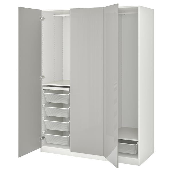 White PAX wardrobe displays storage: shelves, baskets, drawers.