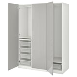 White PAX wardrobe displays storage: shelves, baskets, drawers.