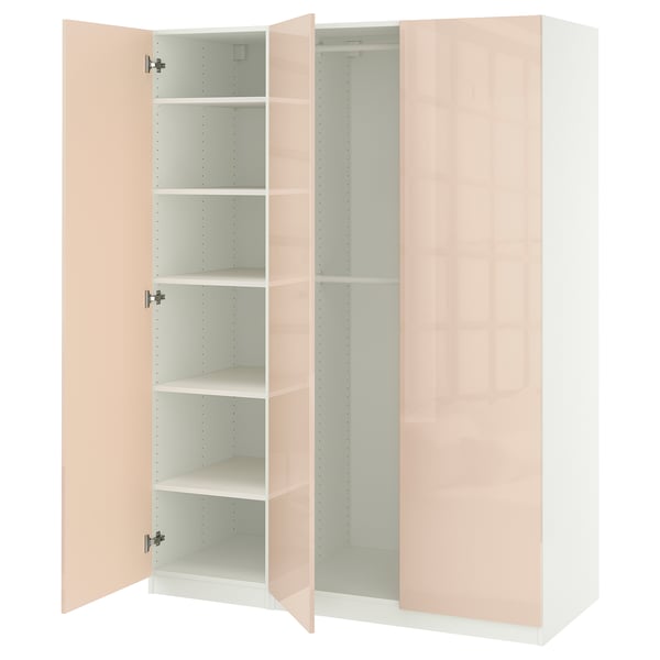 Modern wardrobe named PAX, light pink, with adjustable shelves and soft-close hinges.