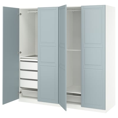 PAX blue wardrobe open, light grey interior, wooden handle, rectangular, modern.