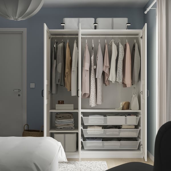 Open wardrobe showing clothes, bags, and storage baskets; adjustable, with slow-close hinges.
