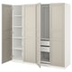 An open white PAX wardrobe with shelves and hanging space.