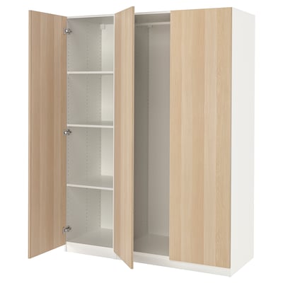 PAX wardrobe: light wood, white interior, adjustable shelves, soft close doors.