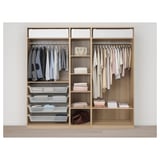 Organized wardrobe with clothes, shelves, and storage bins.