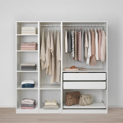 Closet organizer: clothes hangers, shelves, drawers for storing garments.