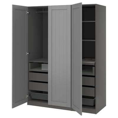 An open gray PAX wardrobe with drawers and shelves.