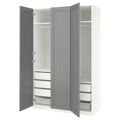 White and grey PAX wardrobe, open showing shelves and drawers.