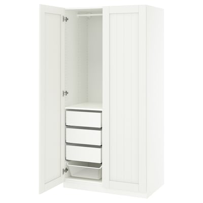White ikea PAX wardrobe with open door, metal rail, and mesh basket.