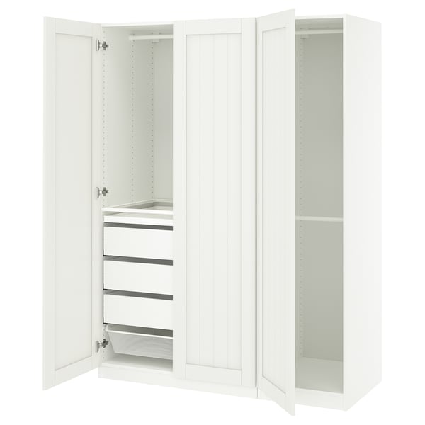 A white ikea PAX wardrobe with open doors revealing shelves and drawers.