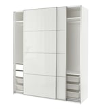 White PAX wardrobe with mirrored sliding doors, containing shelves and mesh drawers, offers modern storage.