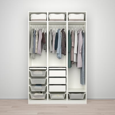 White PAX wardrobe with mesh baskets and hangers, adjustable feet, soft-close doors.