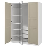 An open ikea PAX wardrobe in beige with white shelves and a mesh basket. It a minimalist design with adjustable shelves and soft-closing hinges.