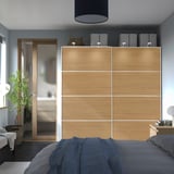 Modern bedroom with PAX wardrobe and bed