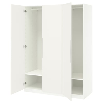 An ikea PAX white wardrobe with open doors, revealing empty shelves.