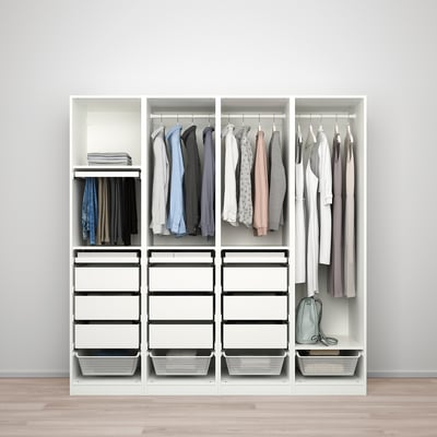 A stylish, functional wardrobe named PAX, featuring adjustable feet, hanging clothes, shelves, and drawers with felt-lined trays.