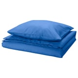 Bright blue bedding set, neatly folded, with smooth fabric and clean lines.