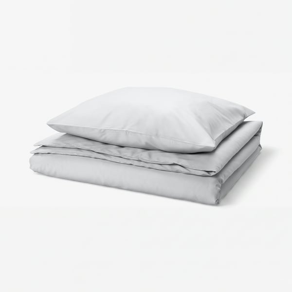 Light grey PILTANDVINGE duvet set with smooth fabric, rectangular shape, and button closure.