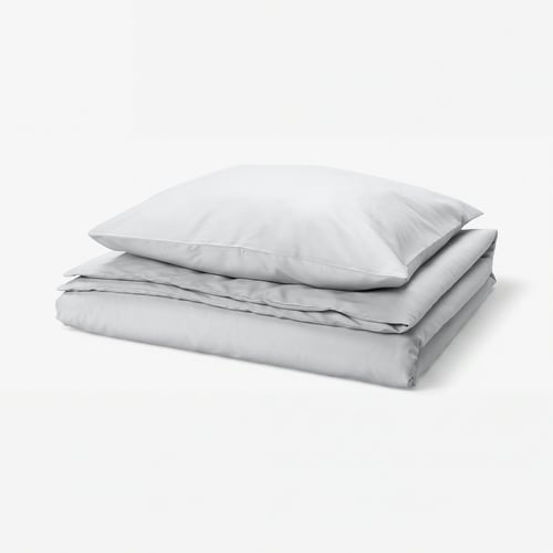 Light grey PILTANDVINGE duvet set with smooth fabric, rectangular shape, and button closure.
