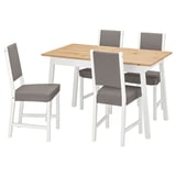 A white and wood dining set named PINNTORP. It includes a square wooden table and four matching chairs with gray cushions.