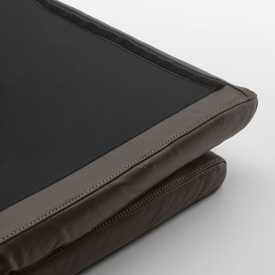 High-quality leather cushion, showing durable stitching and fine craftsmanship on soft, comfy material.