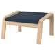 Light wood POÄNG footstool with dark blue cushion.