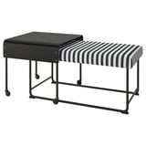 Simple black and white striped bench with metal legs and wooden top. Modern scandinavian design.