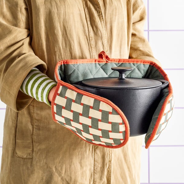 Cook in forearm protection.