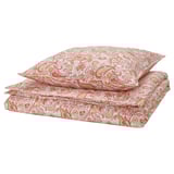 A neatly folded RODGERSIA bedding set in red paisley print with white background, made of cotton and viscose.