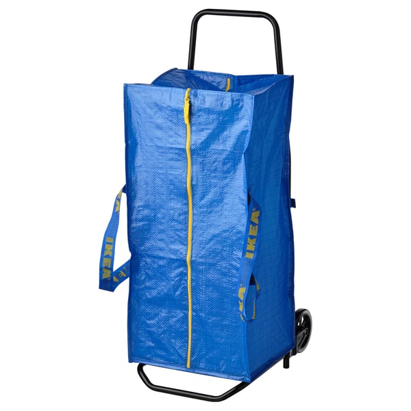 Blue ikea RULLEBÖR bag on black trolley; rectangular, zipper, handles.
