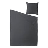 A grey duvet cover set with a pillowcase, neatly arranged, featuring a zipper closure, made from a blend of linen and cotton.